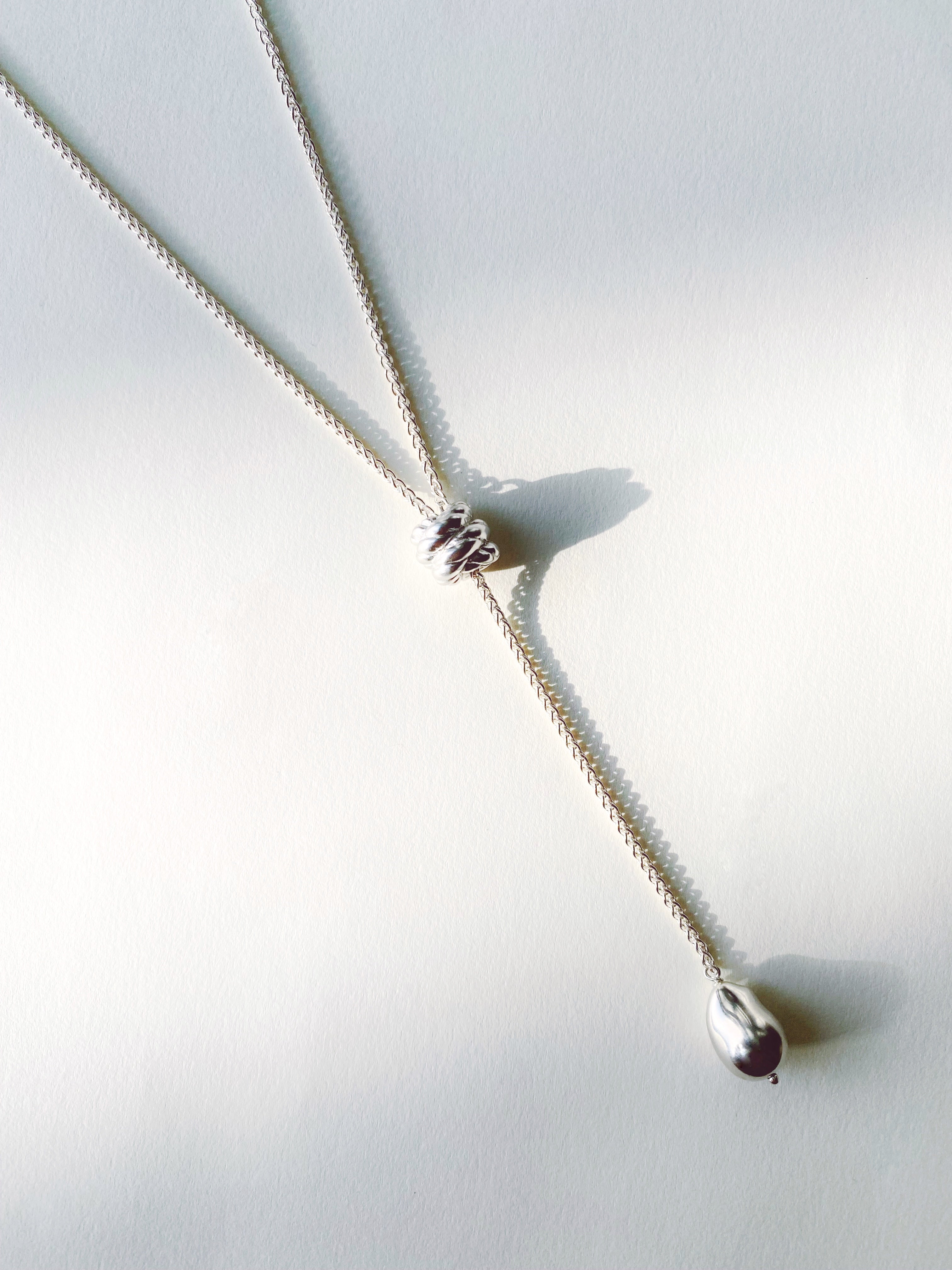 Endless Knot + Cast Pearl Lariat