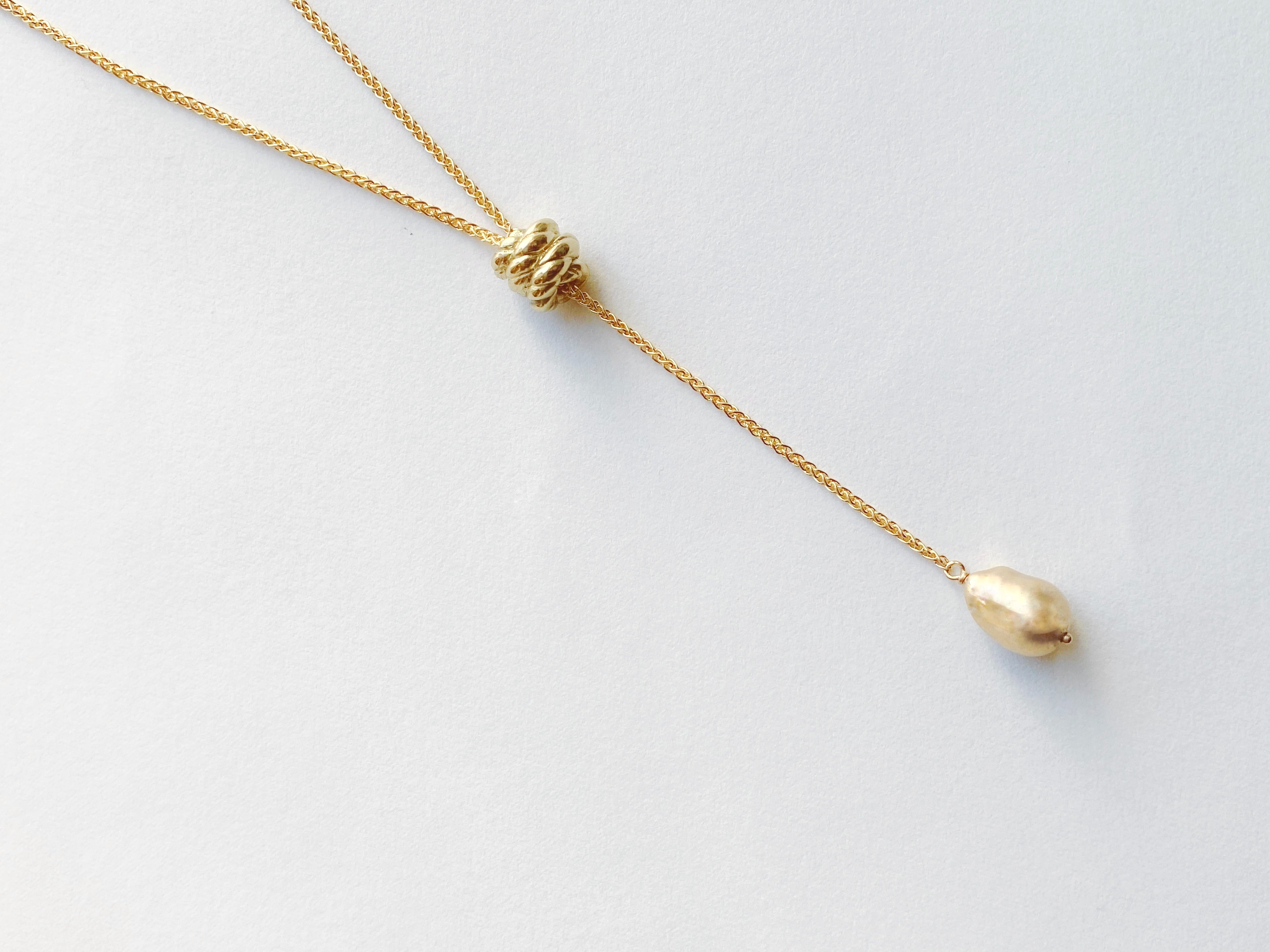 Endless Knot + Cast Pearl Lariat